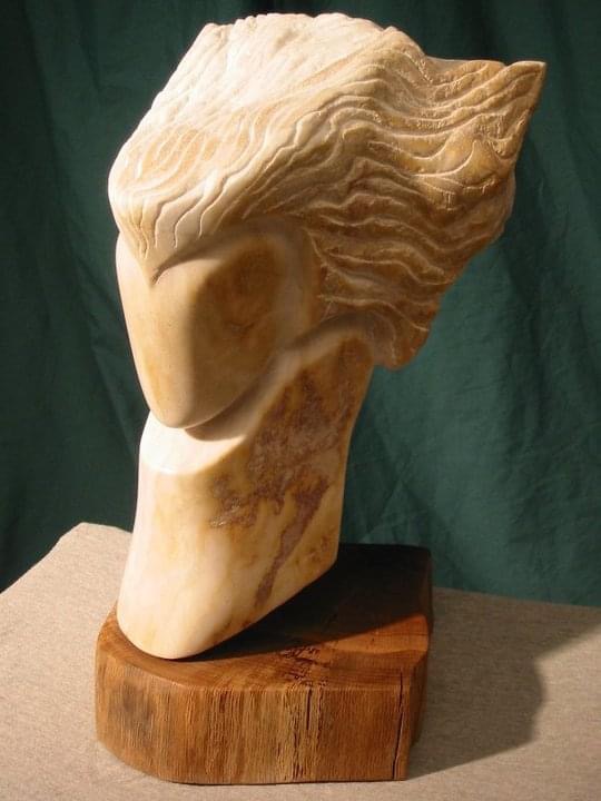 “Mom’s Velocity,” marbled alabaster sculpture of the artist’s mother on a wood base